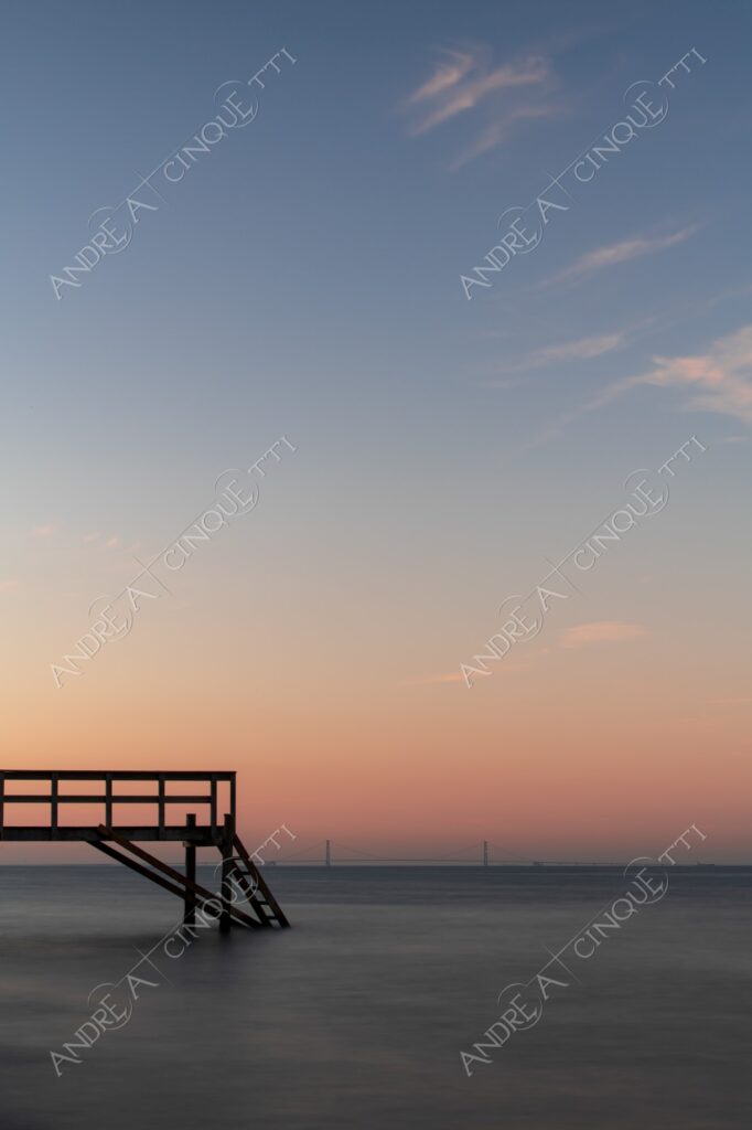 danimarca denmark tramonto sunset sundown crepuscolo dusk twilight alba sunrise molo pier wharf pontile ponte bridge storstrom