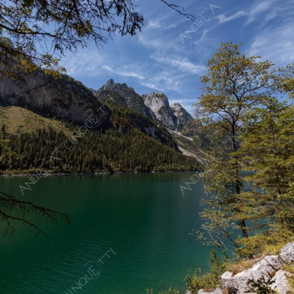 austria hallstat montagne mountains lago lake smeraldo emerald nuvole clouds
