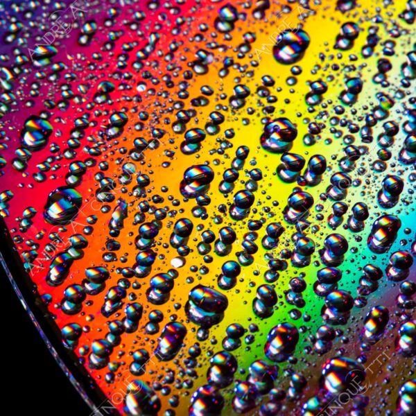 macro photography goccia gocce d'acqua water drop drops riflessi reflections colori colours cd