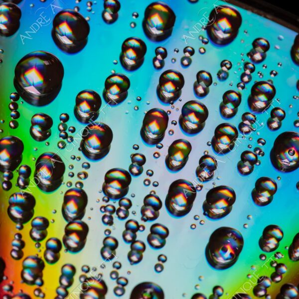 macro photography goccia gocce d'acqua water drop drops riflessi reflections colori colours cd