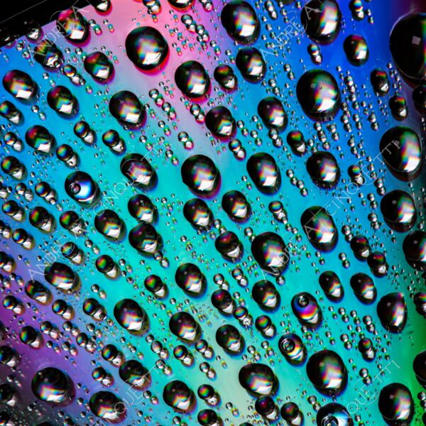 macro photography goccia gocce d'acqua water drop drops riflessi reflections colori colours cd