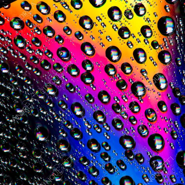 macro photography goccia gocce d'acqua water drop drops riflessi reflections colori colours cd