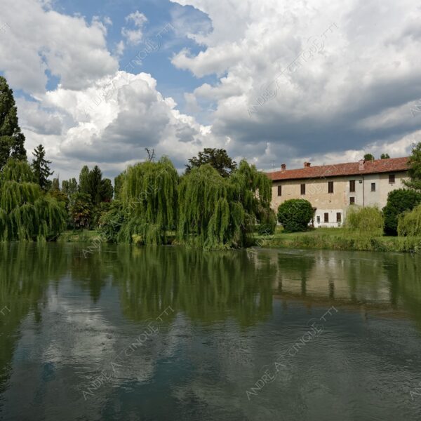 paullo canale canal channel muzza cascina farm salice piangente willow nuvole clouds